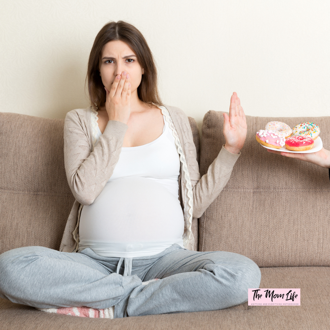 Pregnant Woman Avoiding Food: Morning Sickness and Pregnancy Diet