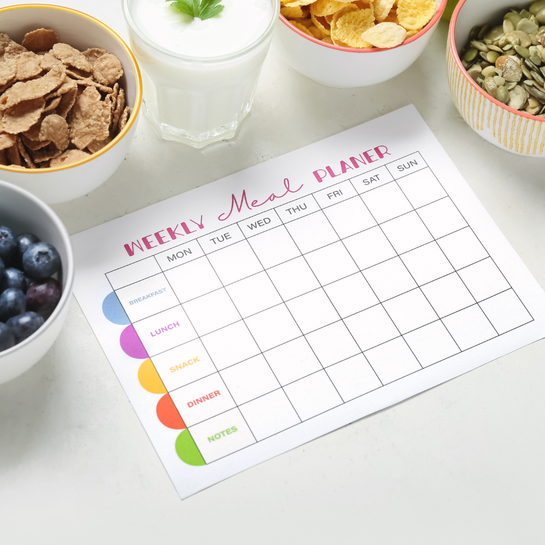 Weekly meal planner with meal prep containers, grocery list, and healthy food ingredients organized and efficient approach to meal planning.