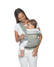 A mother carrying her baby on a baby carrier from Ergobaby Omni. 