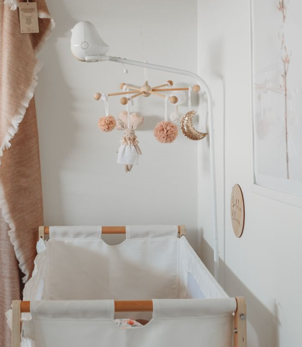 A baby monitor in a crib 